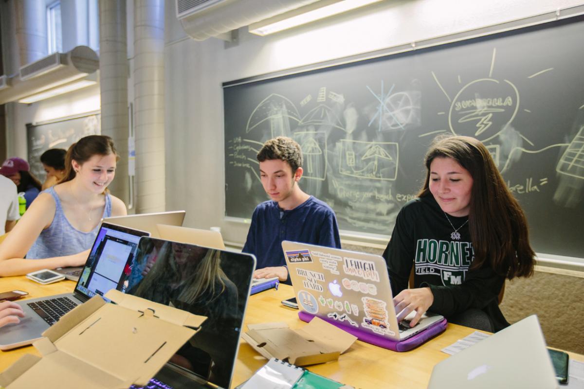 A photo of students on computers.